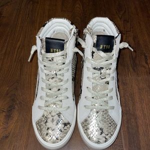 Steve Madden high top sneaker.